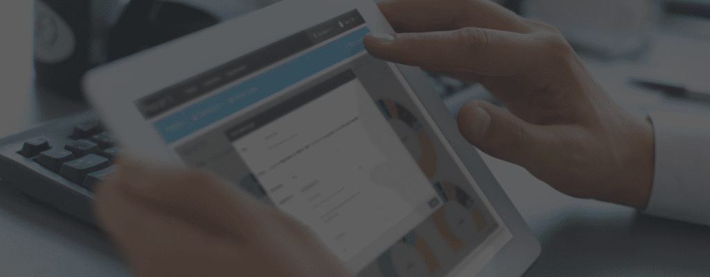manager viewing analytics through a tablet