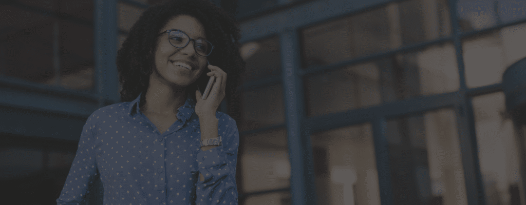 Woman discussing RMA with a business over the phone.