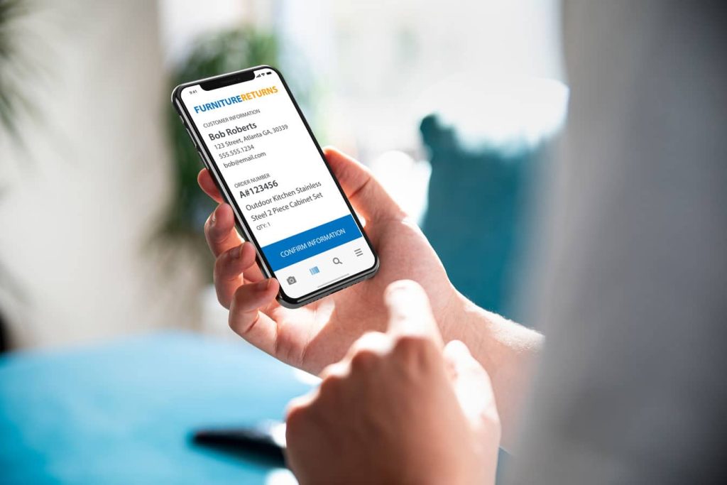 customer confirming their return merchandise authorization information using an iPhone