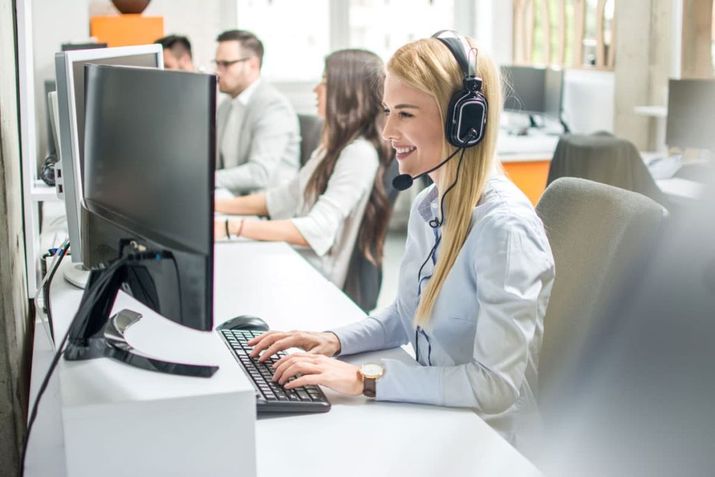 warranty claims representative happily managing a claim