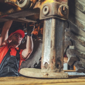 Mechanic working on heavy equipment